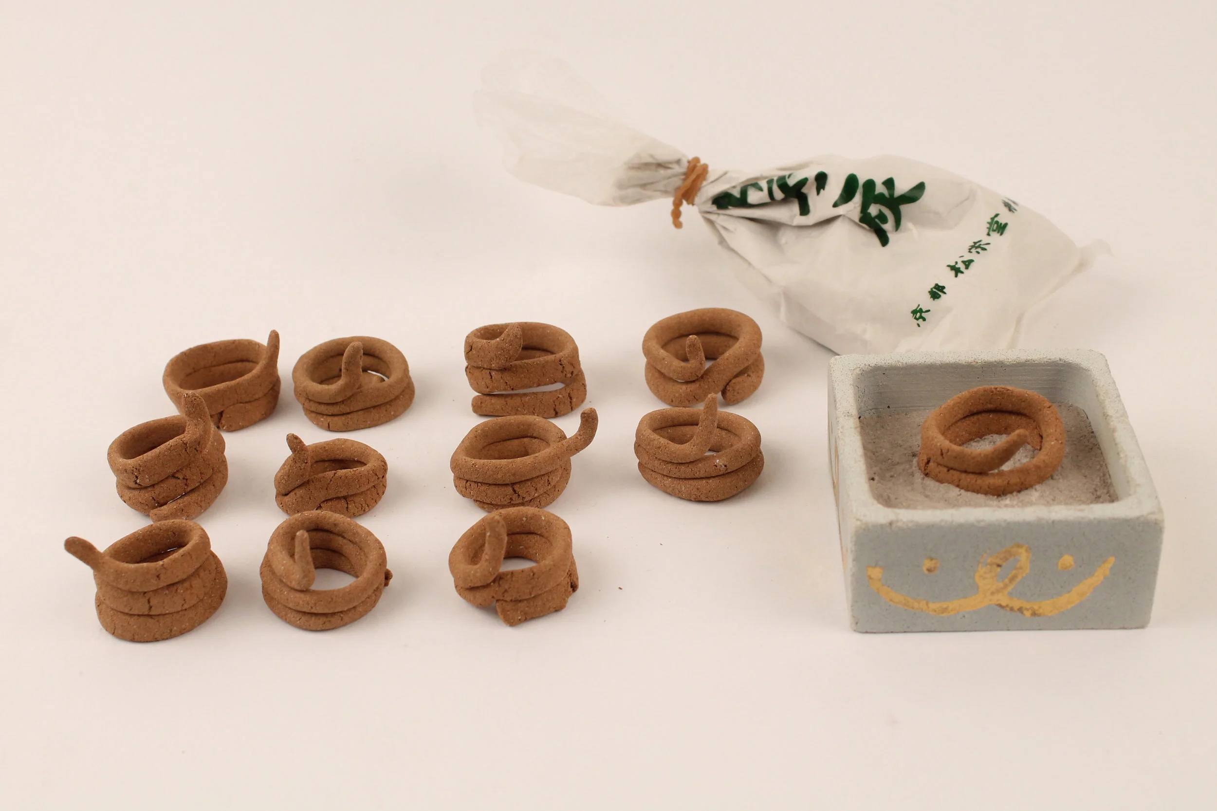 Here are all of the rings I made for the exhibit. The Ash is Japanese rice ash.