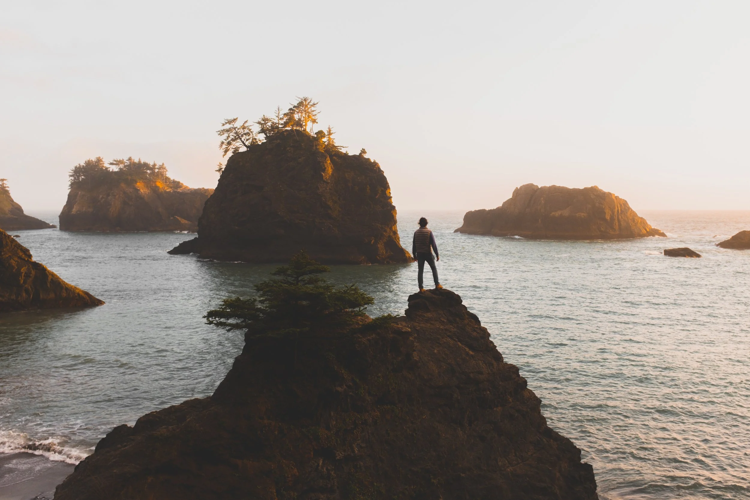 ***man on rock crags in ocean - $ SAVING TIPS StockSnap_8YBFQQ6C5A.jpg