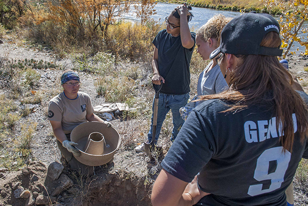 Students receive instruction to plant with the Cocoon