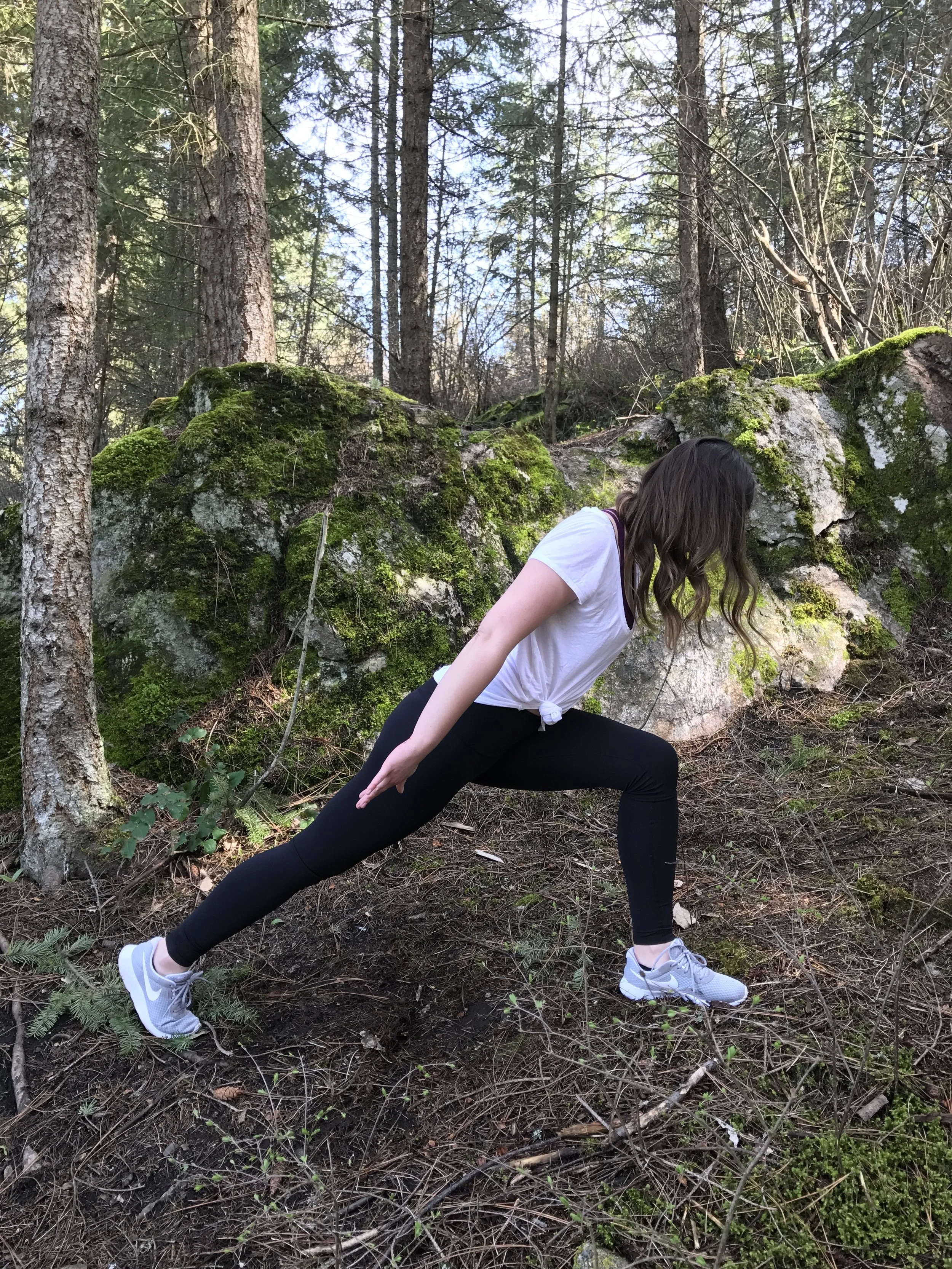Slowly lift the upper body up, pressing the front foot firmly into the ground. Arm are back, palms facing up.