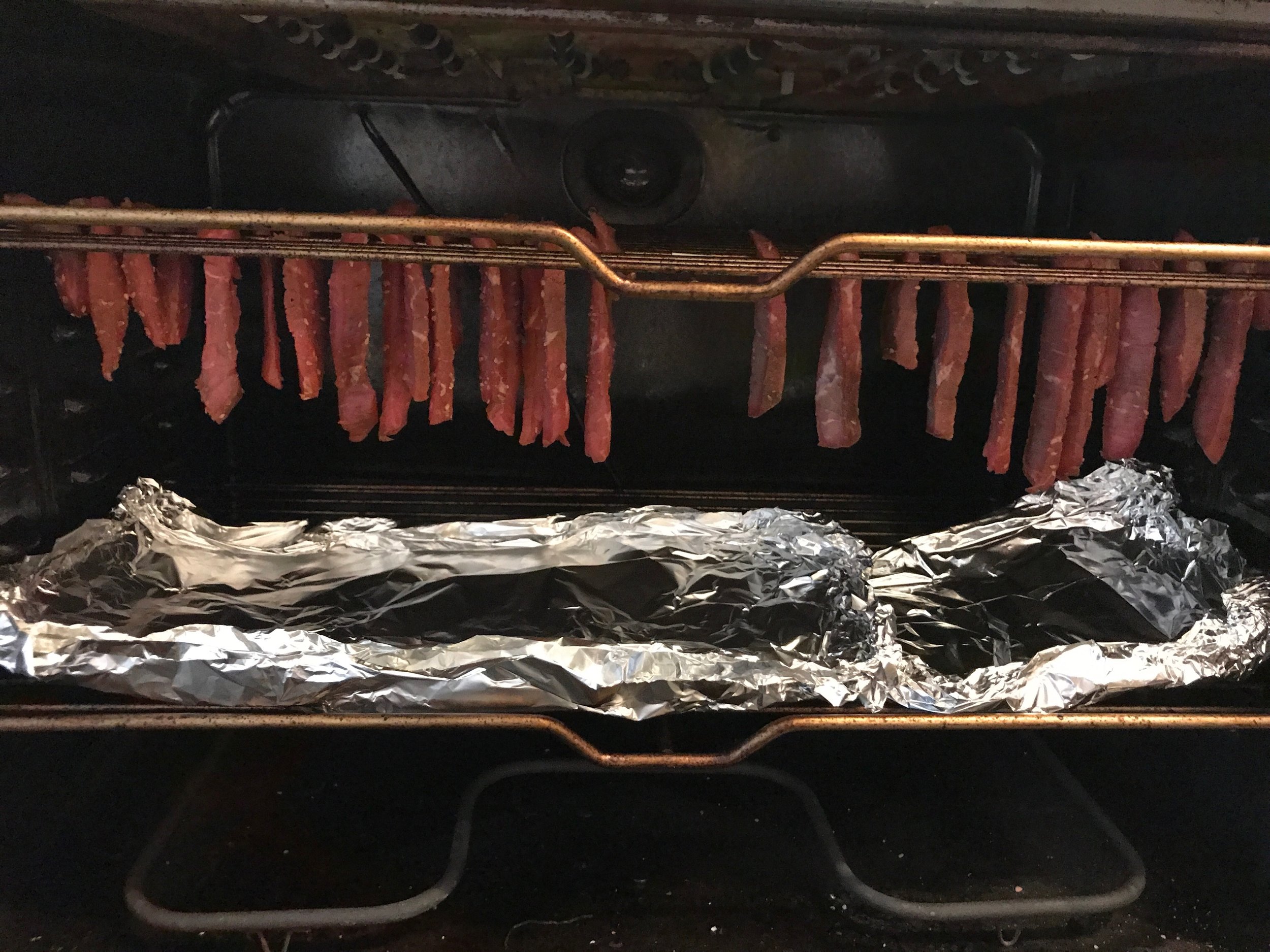 Set skewers in a way so the beef is hanging.