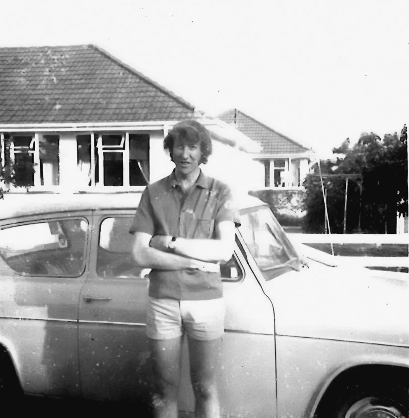 Doug Miller as a young man with car.jpg