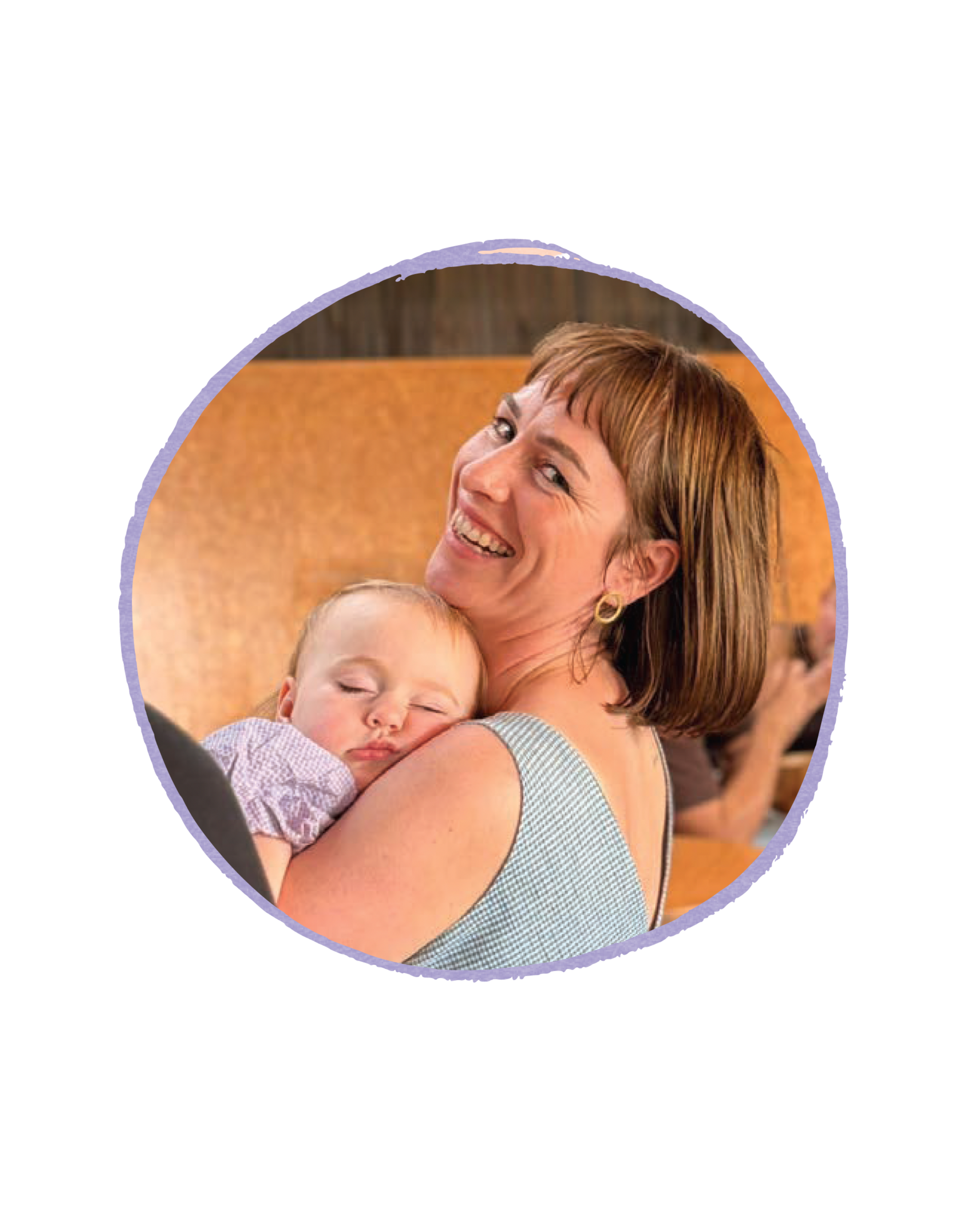 ortrait of Natalie Hampshire, author of Endo Empathy, holding her baby