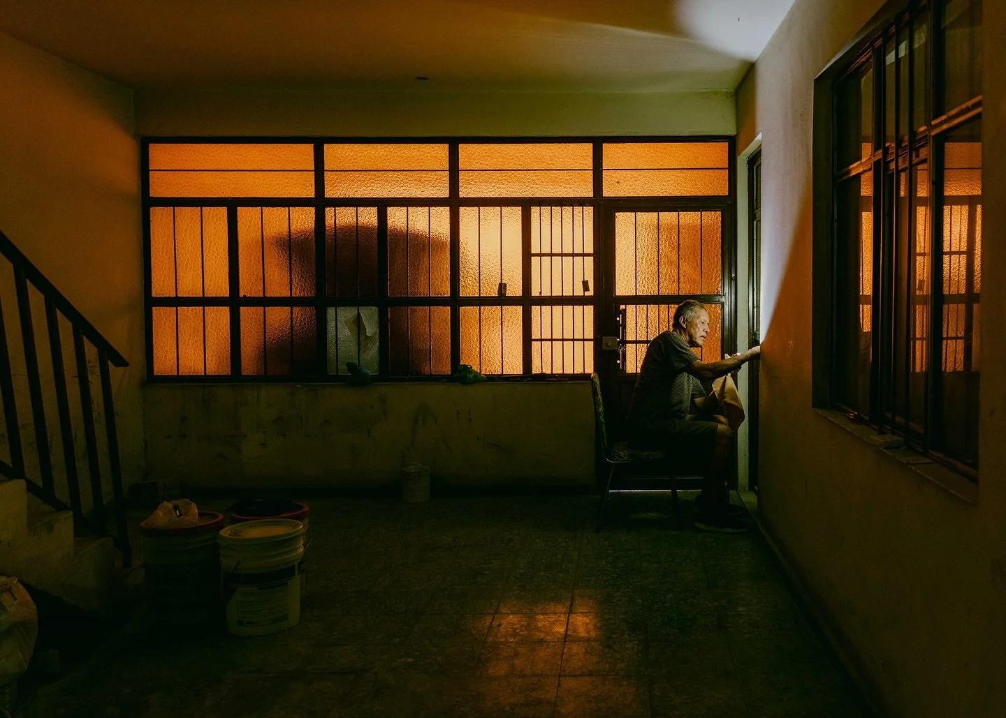 Dad, hastily working to unjam a locked door. One of my favorite images included in my book 𝑹𝒆𝒔𝒑𝒊𝒕𝒆.