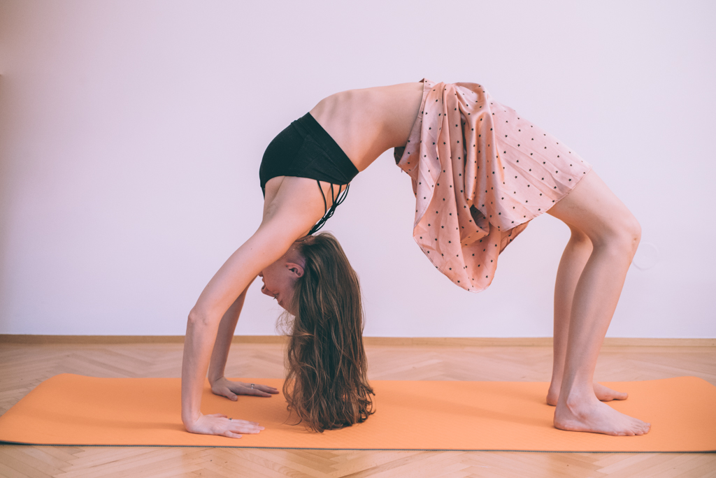 Urdhva Dhanurasana 4 months post partum :)