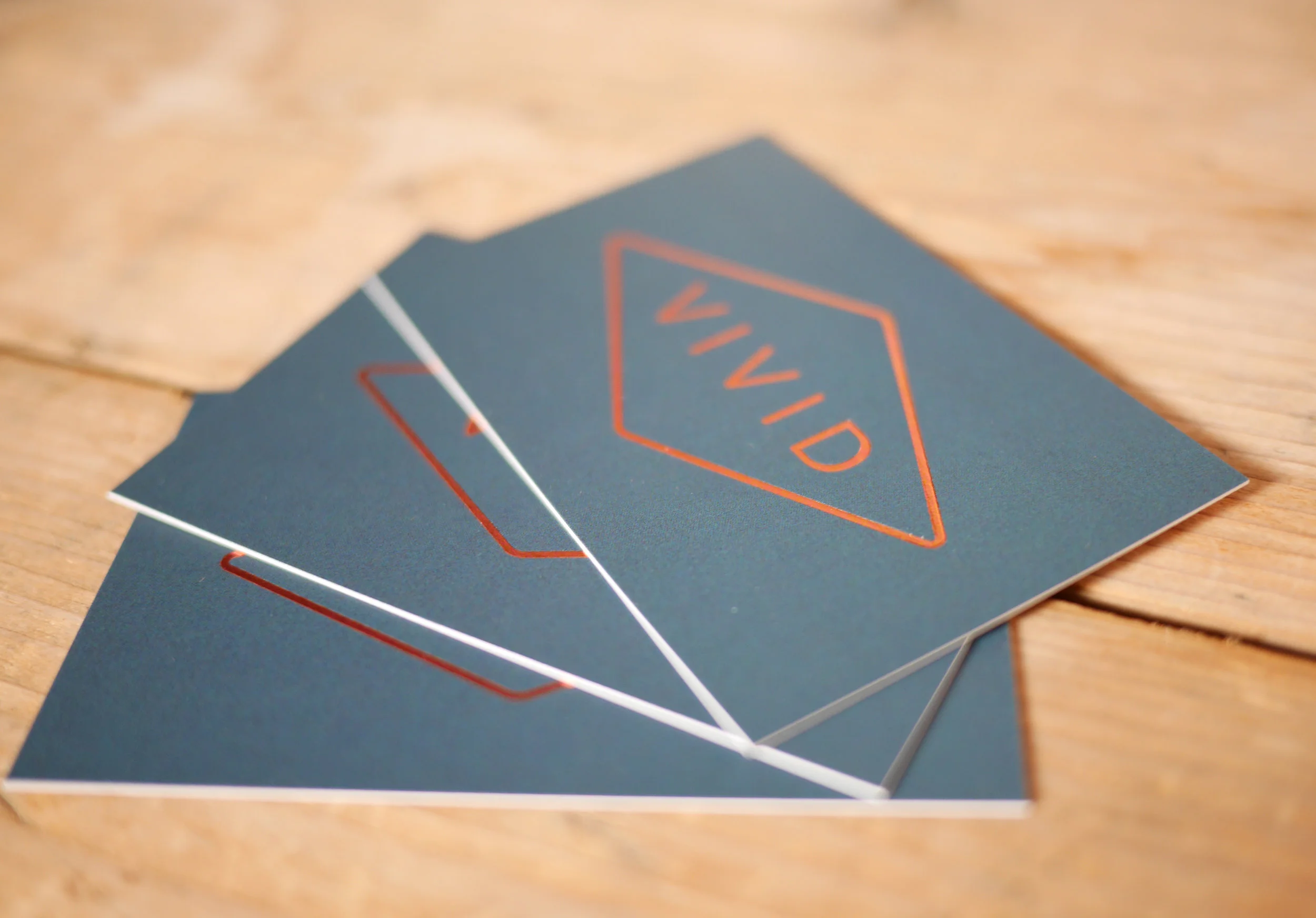 Vivid Kitchen business cards on table.jpg