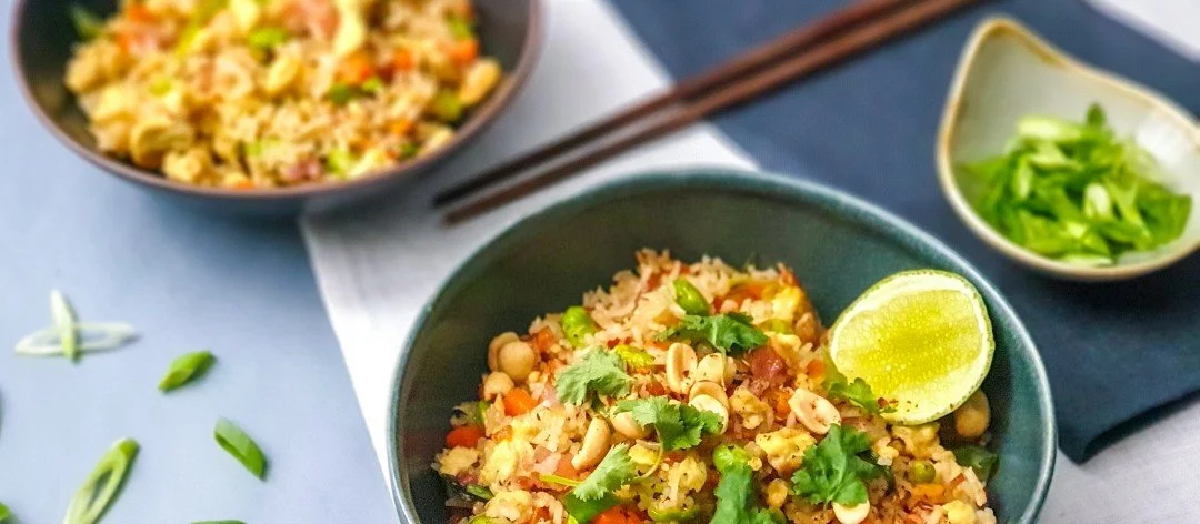 Wok featuring takeaway-style low FODMAP egg fried rice with bacon.