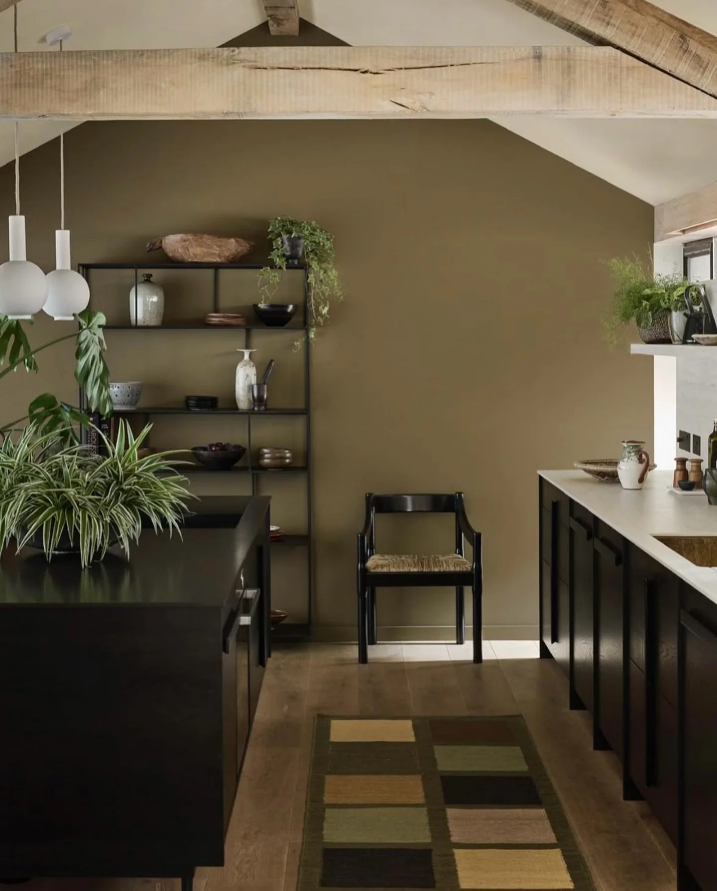 A simple &lsquo;shop the look&rsquo; if you&rsquo;re looking for inspiration. 💚🖤

A smart kitchen with peaty green walls, our Patchwork runner and black cupboards. Who knew sludgy green could be so chic! Giving off cosy vibes for January. 🤎 

📷 L