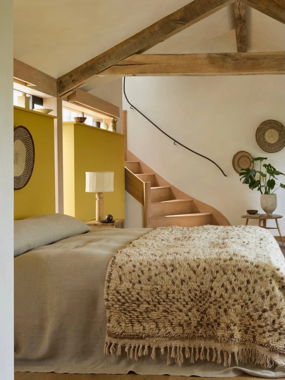 This soft cream Azilal with scattered brown dots is too beautiful to just stay on the floor.

Style it over the end of a bed or beside the bed as it is the perfect length. 

It will add some vintage charm and warmth to any bedroom thanks to its neutr