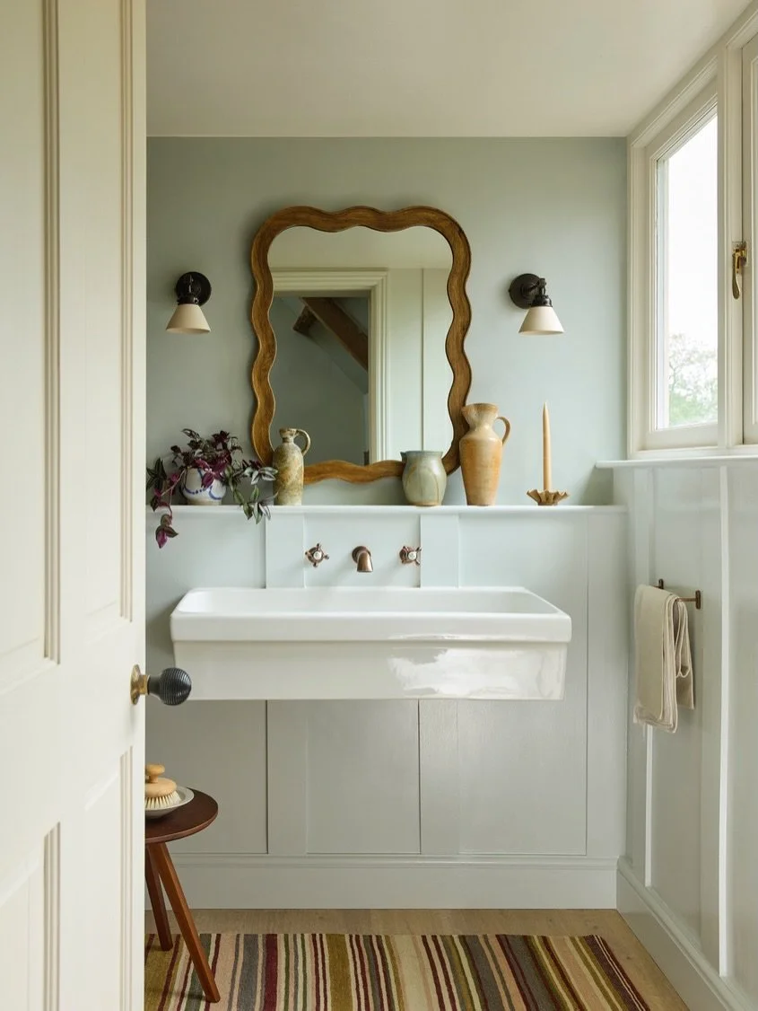 You can&rsquo;t go wrong with stripes - especially in a bathroom. 

The perfect partner for pretty pale blue walls. 🩵 

Pictured is our Claret flatweave rug. Available as a runner and in three larger sizes. 

Scroll to see our Indigo Rose stripe - a