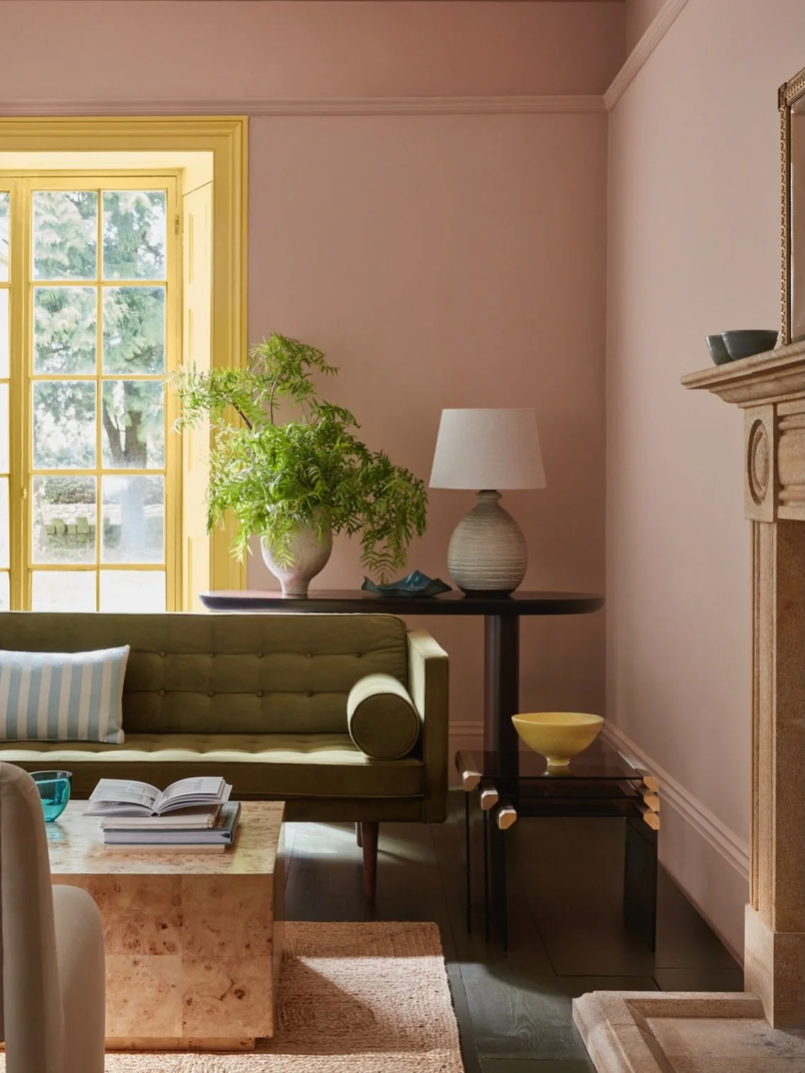 Pink walls and a hit of yellow! 💛 

When there are lots of interesting design details in a room, a rug can settle the space &mdash; creating a balanced look without competing. 

The Robertson jute rug does just that. 

Message us to help with choosi