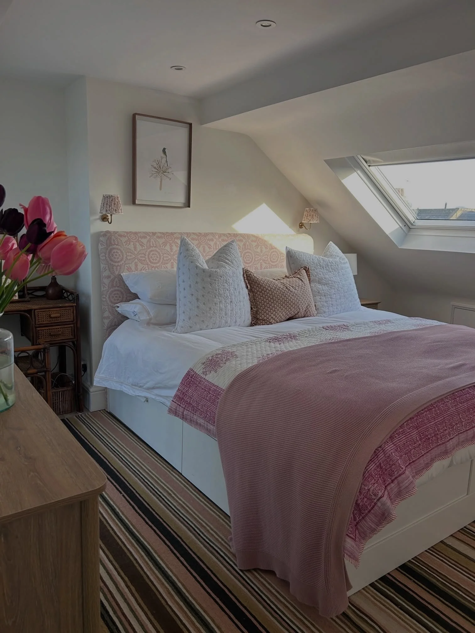 Loft lifestyle! 

Our client has made a stylish sanctuary in her loft bedroom with pretty pinks and our Rose striped rug instead of carpet. 

Flood the room with a rug and you have the effect of a carpet but with a lot more flexibility and affordable