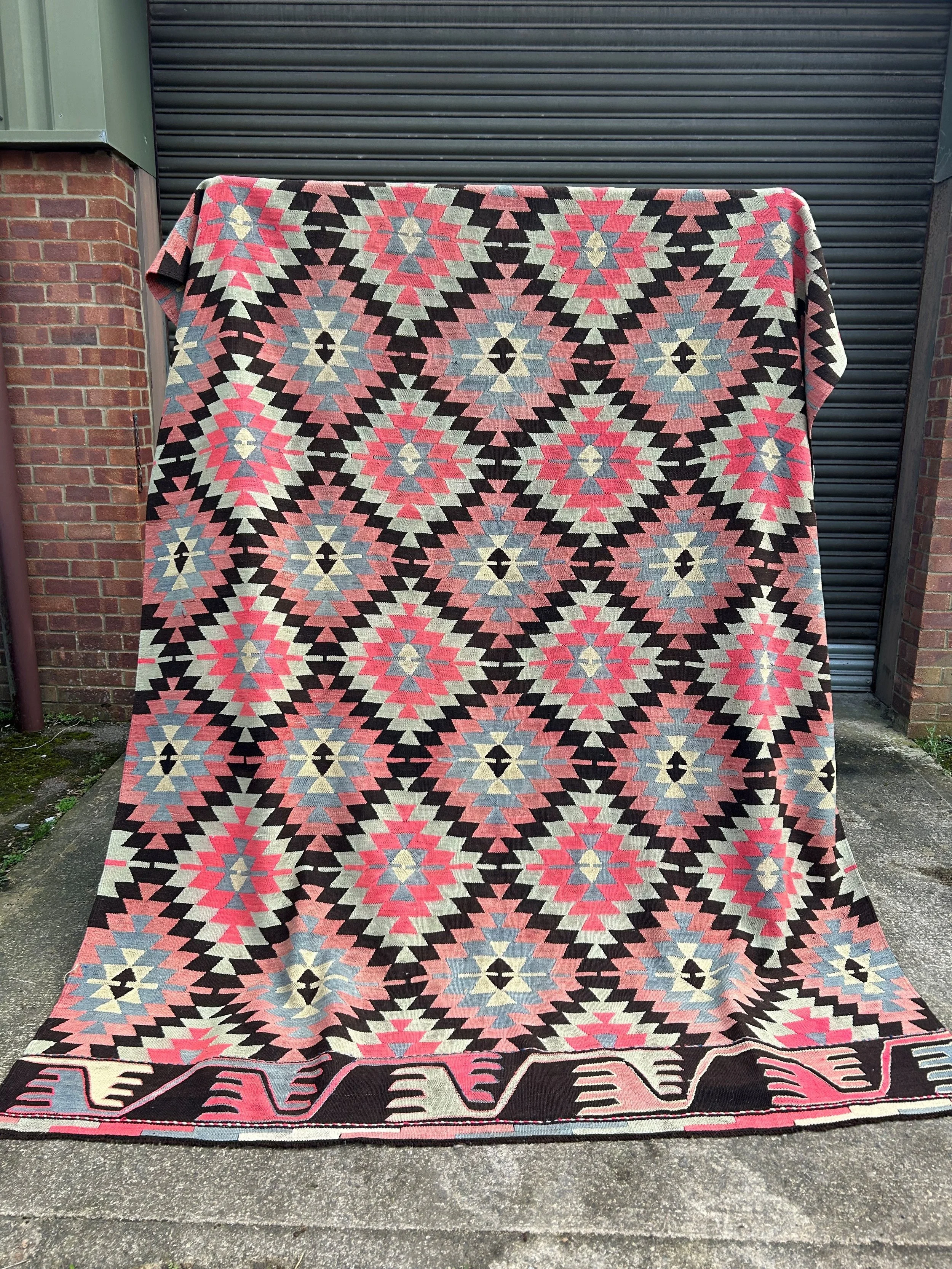 Turkish kilim outside warehouse large.jpg