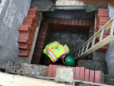 Contractor placed brick for brick manhole. 28+08RT