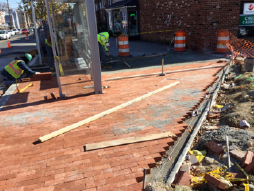 Brick sidewalk being placed on PCC base, station 35+60RT to 36+05RT