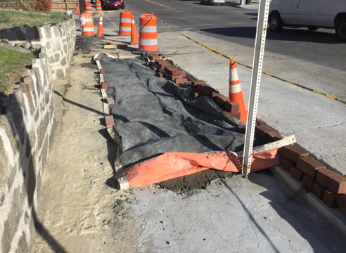 Paving placed blanket over PCC base for brick sidewalk soon after finishing from Sta. 40+45LT to Sta. 40+66LT.
