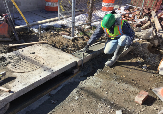 Contractor finishing PCC curb from Sta. 141+94Lt to Sta. 141+97LT.