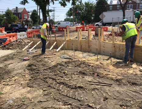 Forms being constructed for brick clad curved wall at station 48+00LT to 48+10LT