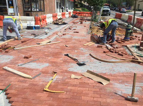 Brick sidewalk at the north-east corner of Kennedy street and 1st street NW