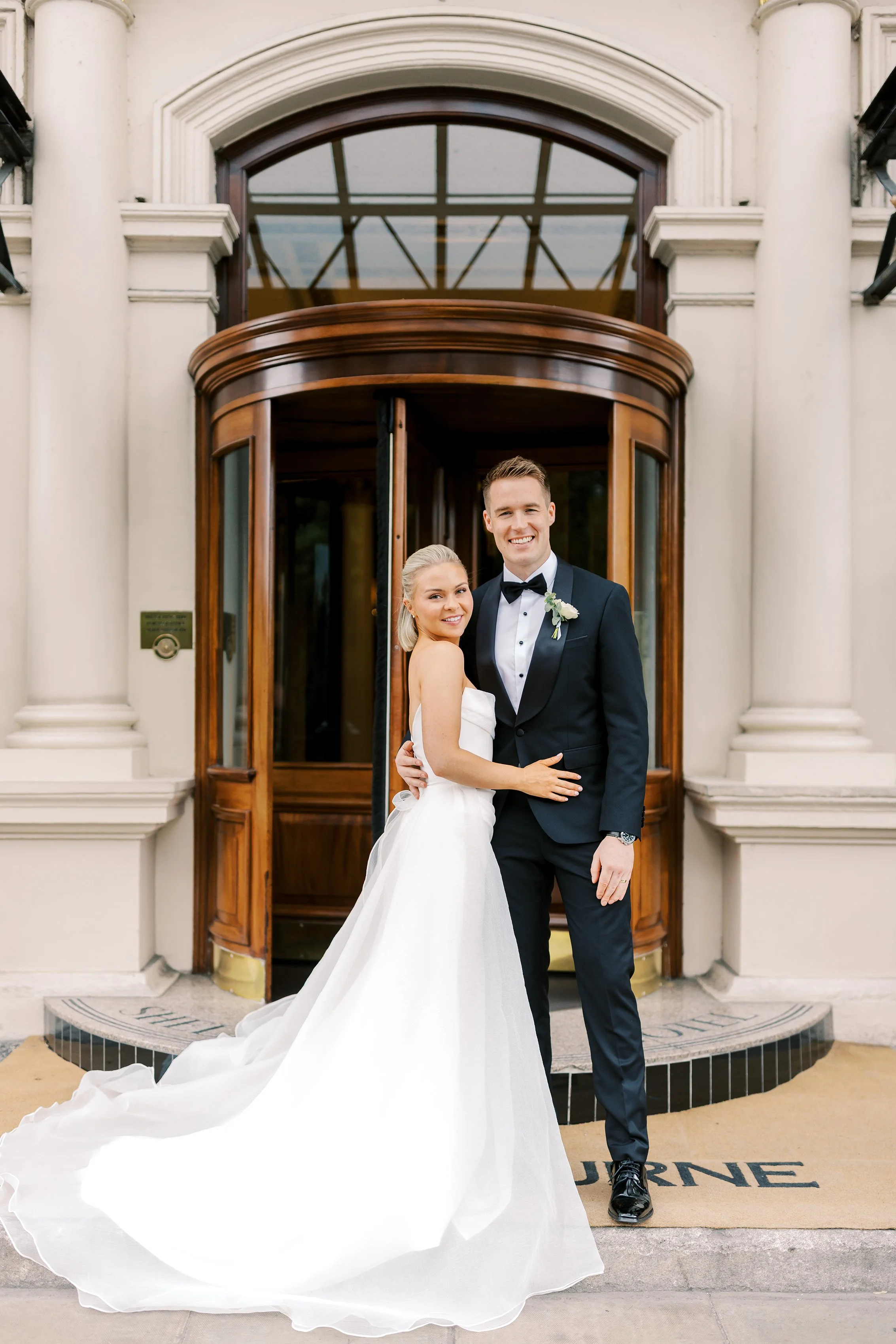 Portrait at the entrance to shelbourne hotel