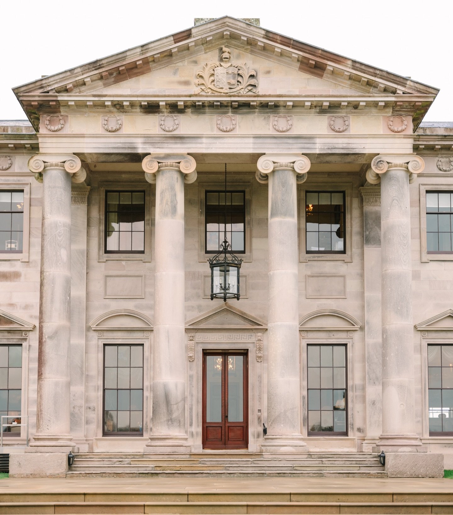 Nestled in the peaceful countryside of the Irish Midlands, the exterior of Ballyfin Demesne offers one of the most romantic wedding settings in all of Ireland. Surrounded by 614 acres of private parkland, ancient woodlands, and a shimmering lake, thi