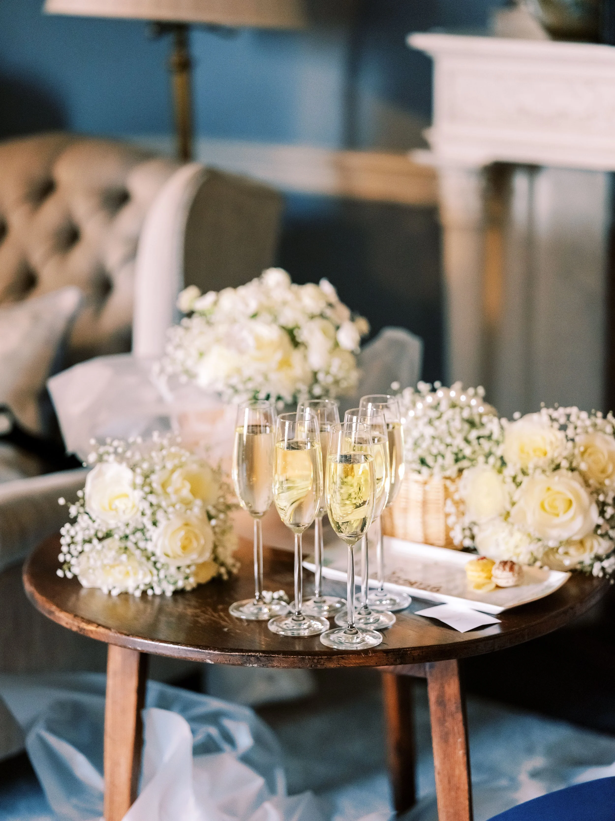 Wedding champagne glasses with blue background at Luttrellstown Castle wedding venue