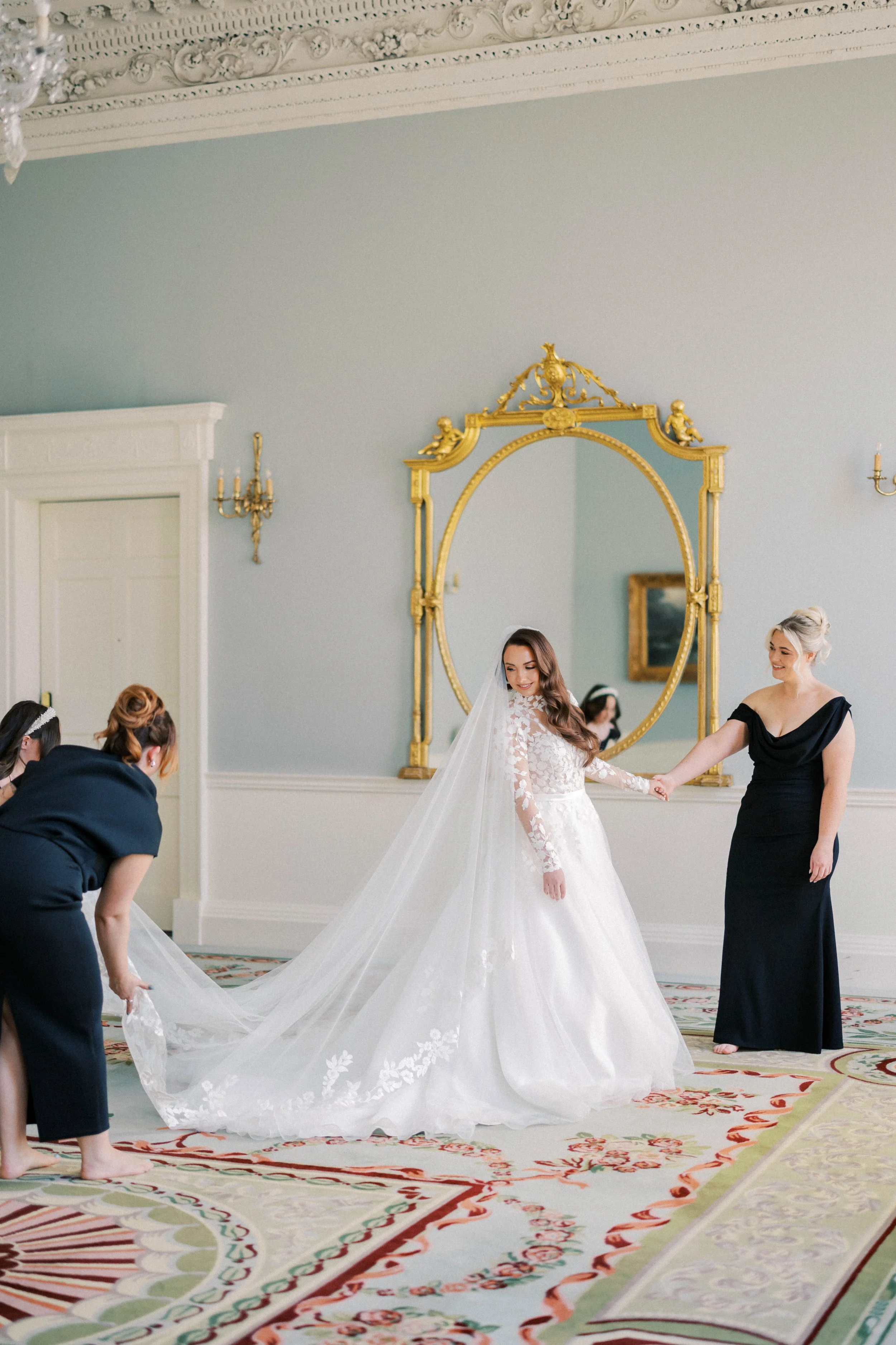 Bride and groom walking through the gardens at The Merrion Hotel in Dublin