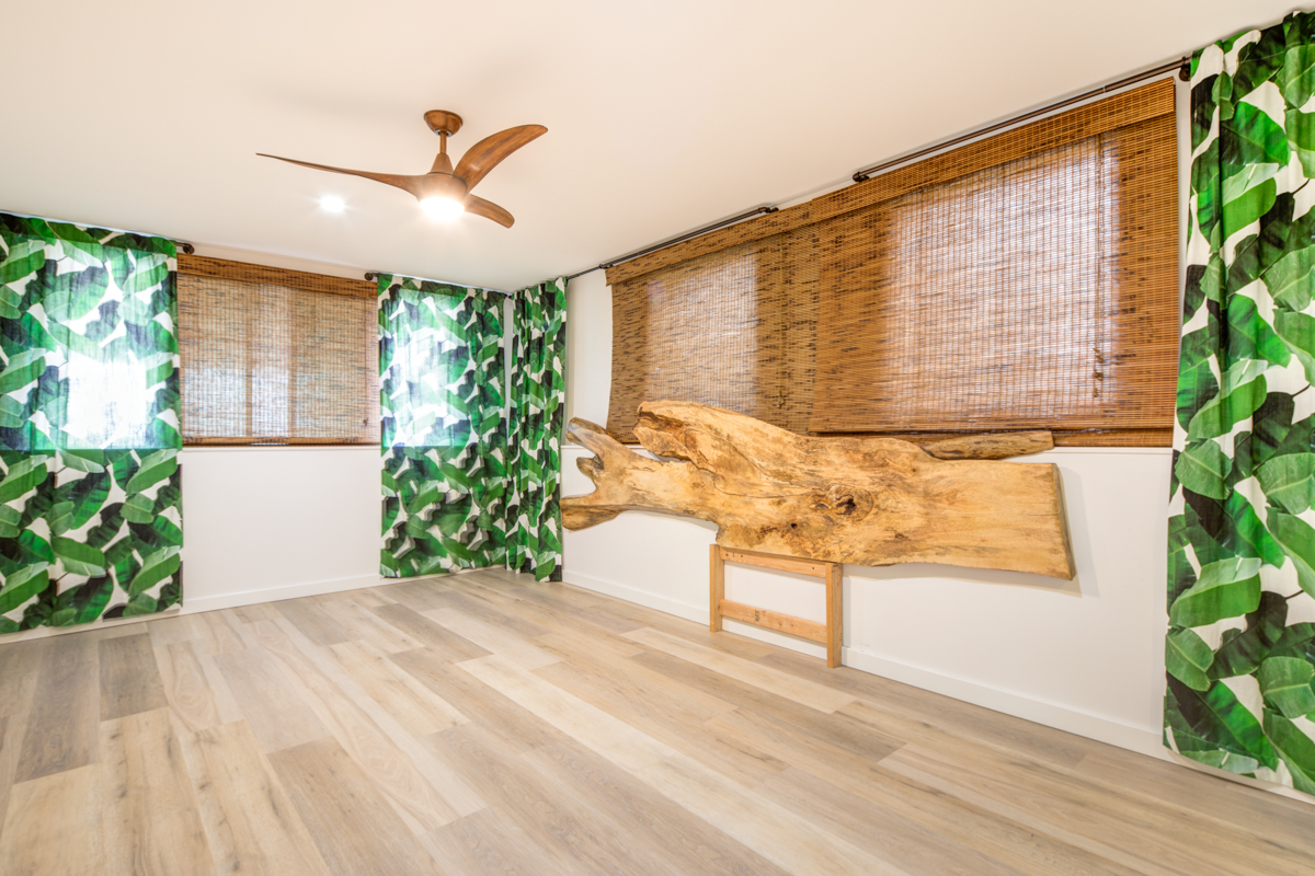 We created a totally one of a kind Mango Slab Head Board for this beach feel bedroom. We got this slab from Kalama Hardwoods.