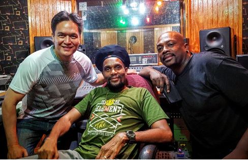 Left to Right: Mark Loquan, Junior "Ibo" Joseph, Anslem Douglas in the studio