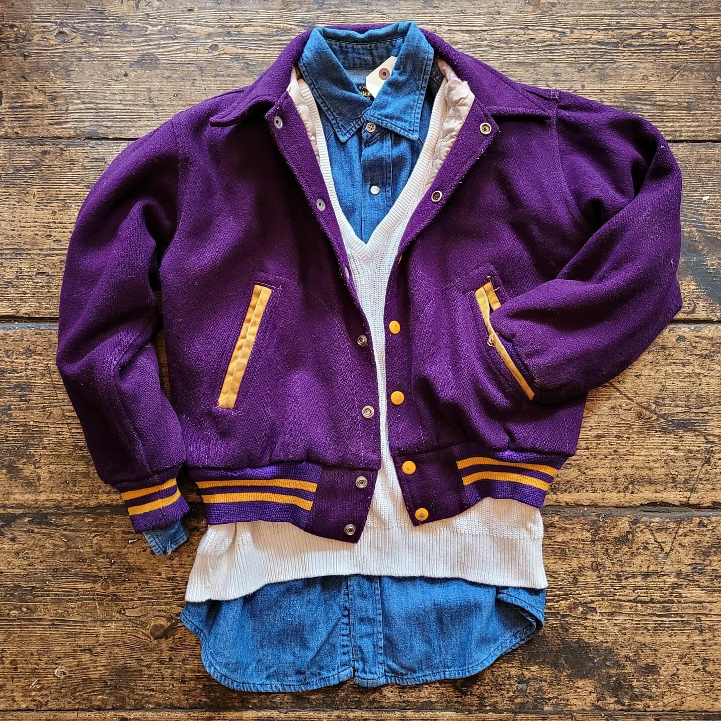 Todays outfit, Spring layering.
.
.
.
1950s varsity jacket, classic 50s style in a very deep purple and yellow, reads Clarkstown across the back, size UK small, &pound;75.
.
.
.
Worn over a very early, made in France, Lacost v neck, size medium, &pou