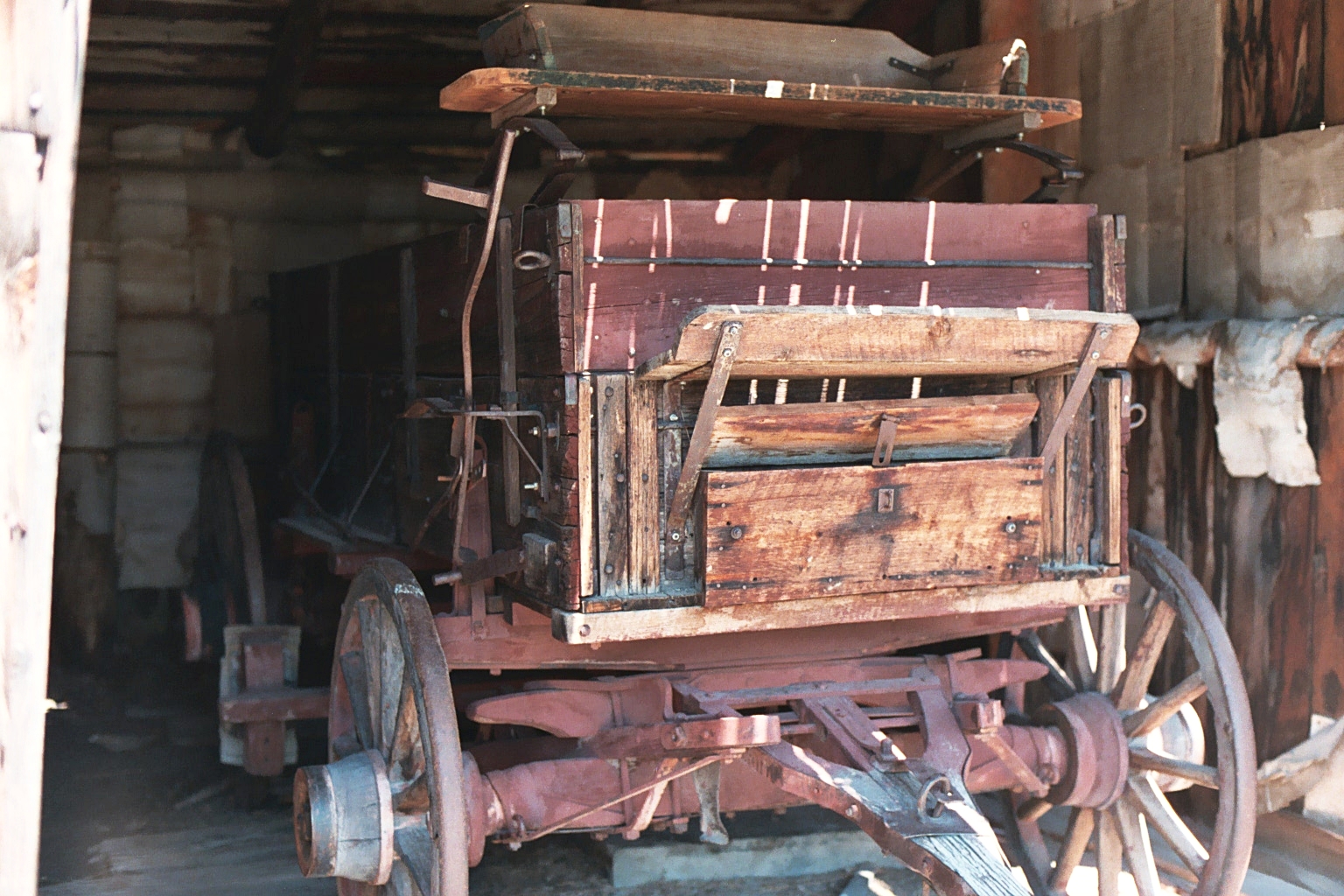 Buckboard Wagon in shed.JPG