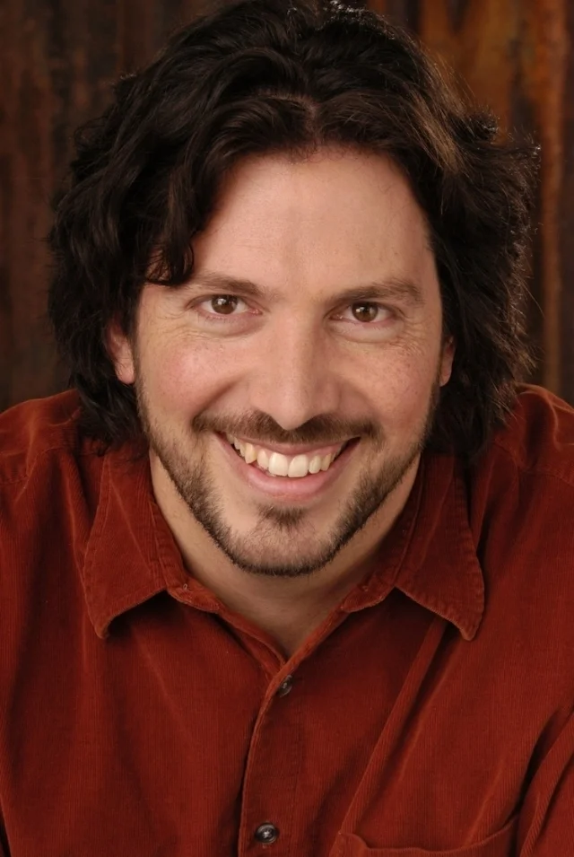 Richard Hatem Debonair screenwriter, Bon Vivant, celebrated wit, casual philosopher, "Man of Letters" and The Most Interesting Man in the Astonishing Legends Studio