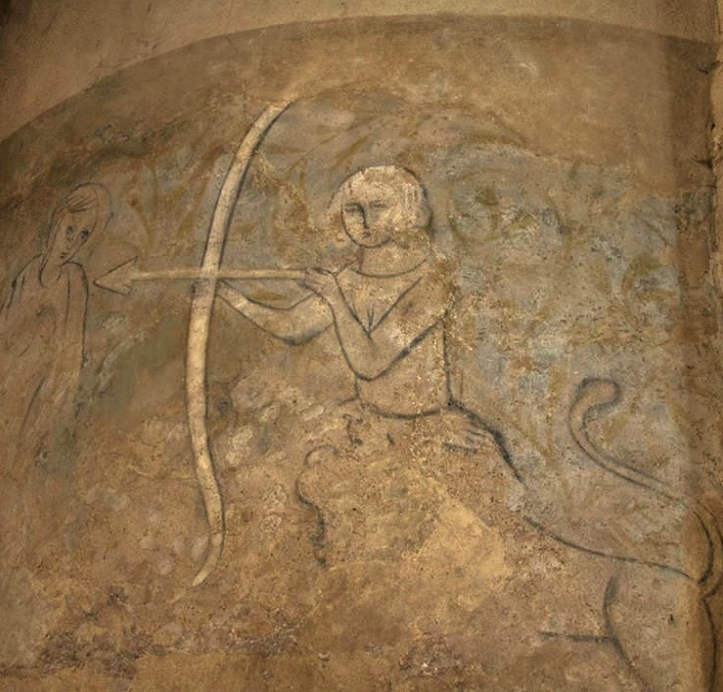  Image of a faded fresco in the castle which appears to show a chimera type of creature; a woman's torso coming out of a lion's head. &nbsp;Notice that the bow is drawn with the lion/woman's left hand, an archaic symbol of evil, and aiming at what lo