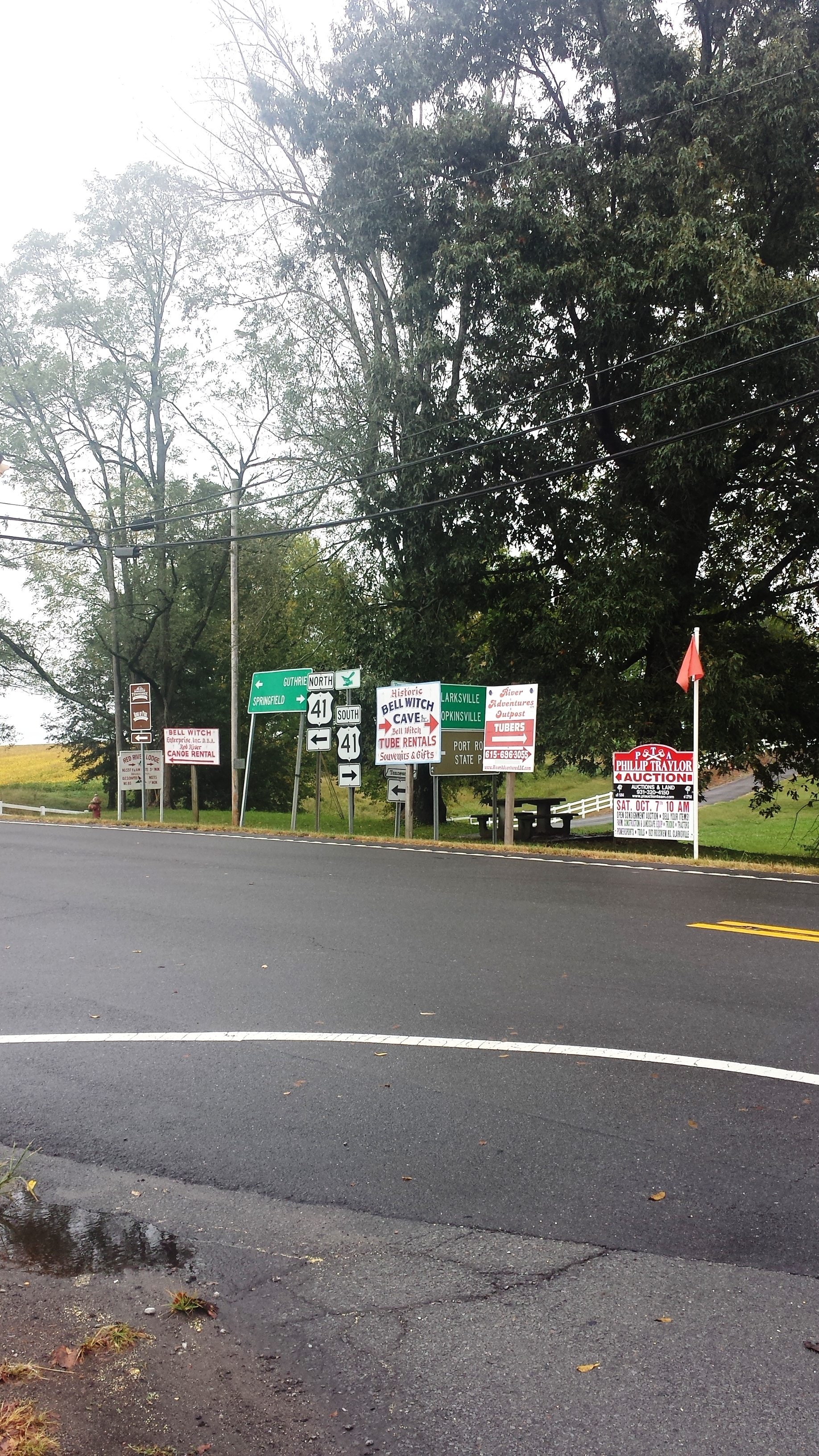 Signs pointing to the Bell Witch Cave