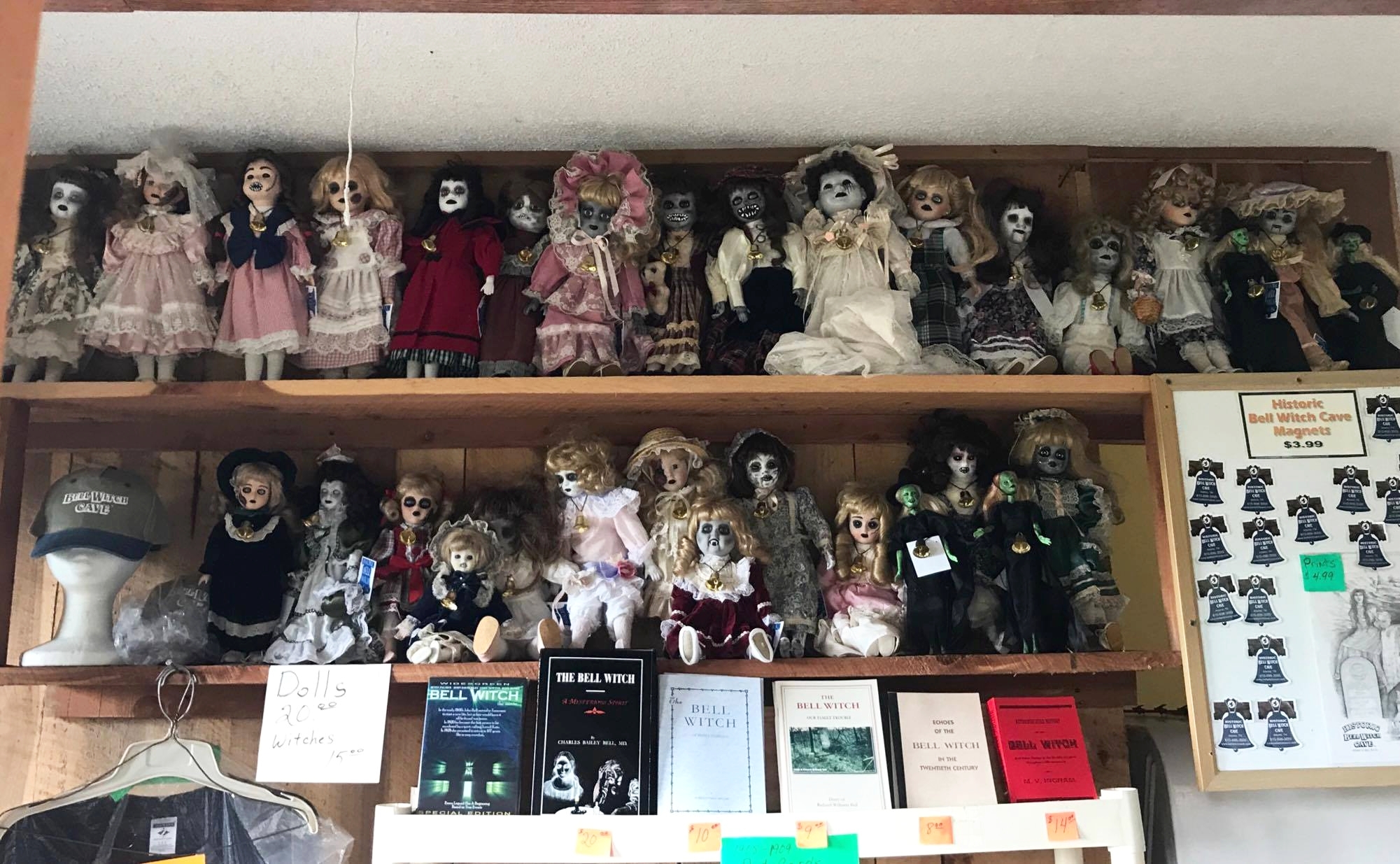   A collection of creepy dolls, books and other souvenirs for sale in the Bell Witch Cave gift shop  
