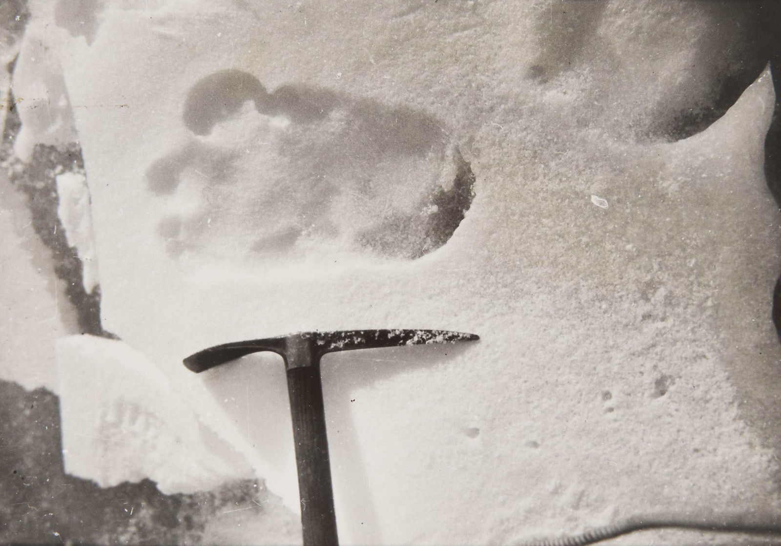  The original framing of Shipton's famous "Yeti footprint" photo. 