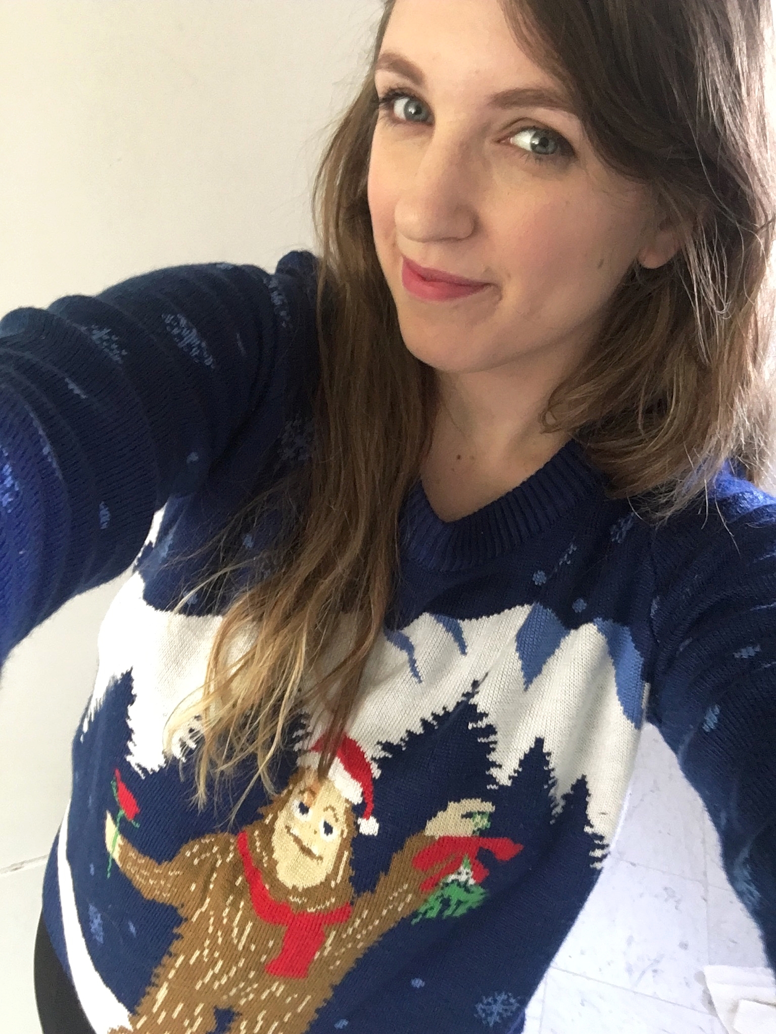  Tess Pfeifle wearing her favorite "Sasquatch holding Mistletoe and a Rose" Christmas sweater 