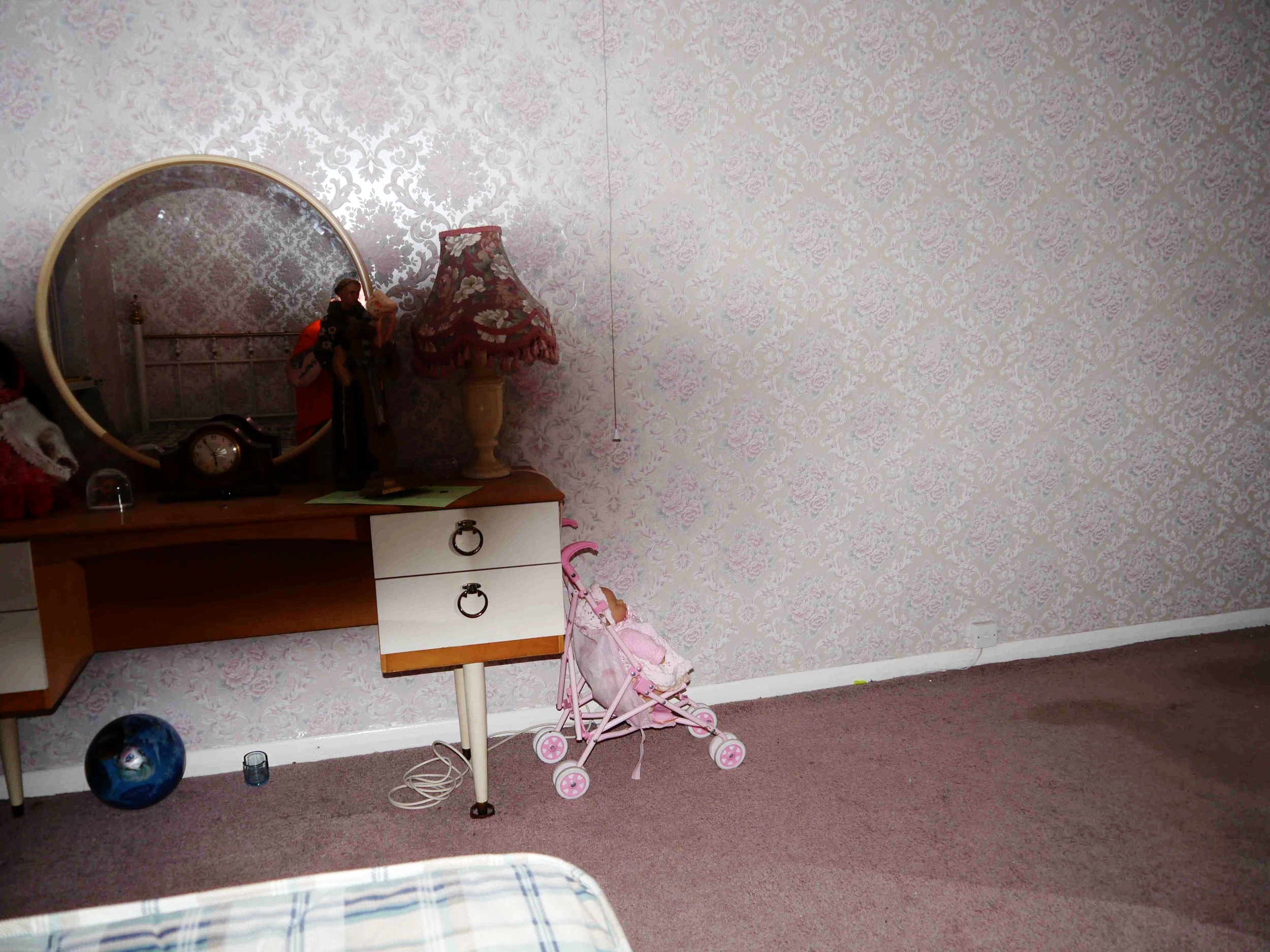 The shadow in Diane’s room. The baby stroller, snow globe and ball if taken elsewhere, end up back in this room. From the 30 East Drive website , photo by Steven J.