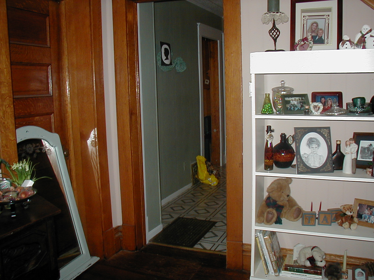  Tony Pickman started taking pictures in their new house when he felt something was not right.  Notice his sketch of the little girl on the shelf. 
