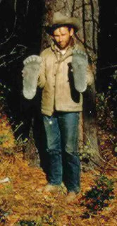 Roger Patterson shown with two plaster castings he took of “Patty’s” footprints at the Bluff Creek encounter site.