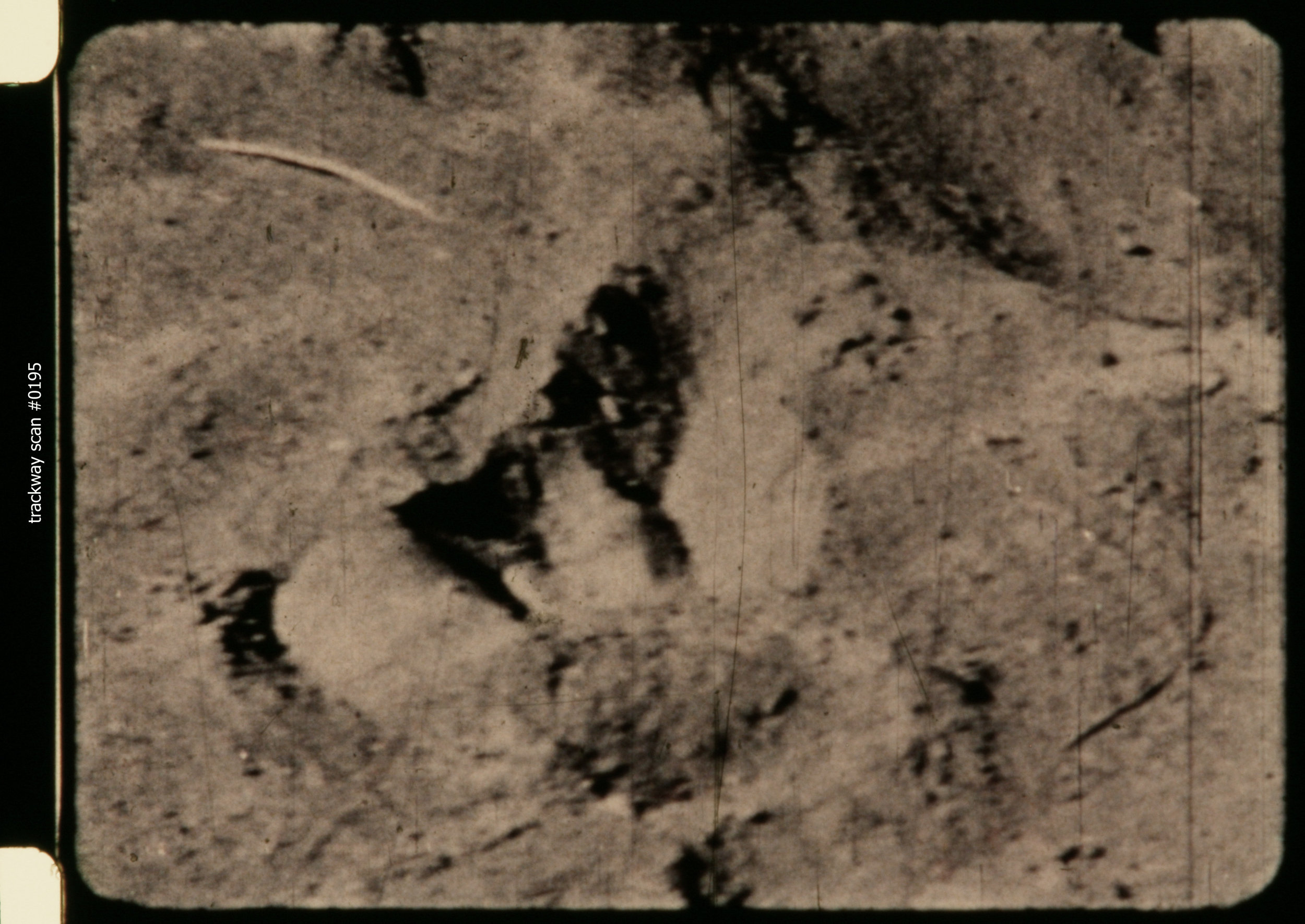 Scan #0195 by Bill Munns of trackway footage from John Green’s archives. “This was the first time this footprint footage was ever scanned at 4K resolution, every frame known to exist. The four reference images … are among the sharpest frames for each footprint. The footage was scanned end to front, which is why scan numbers are highest first, lowest last.”