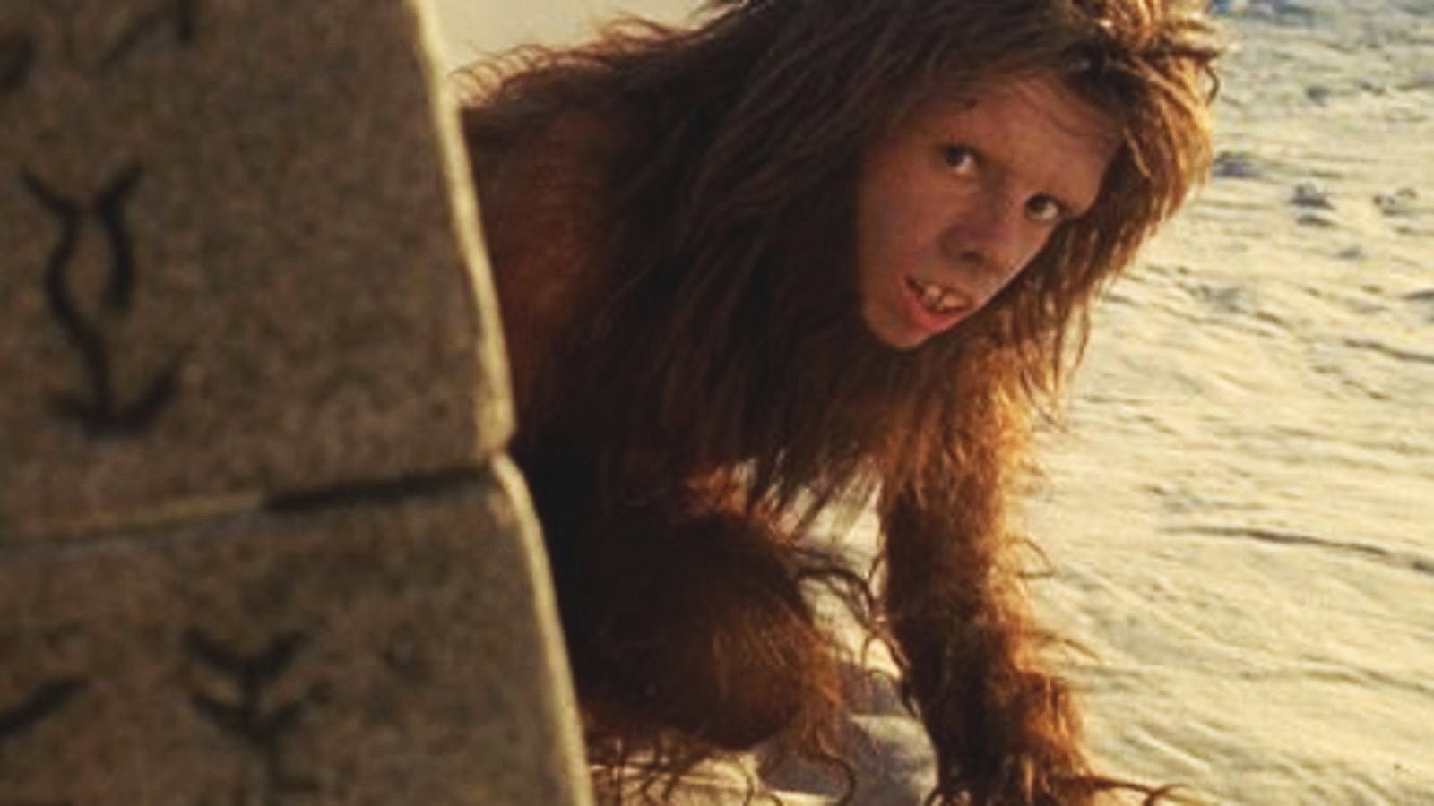  A production still from   Land of the Lost   with  Jorma Taccone , in full costume as “Chaka”  