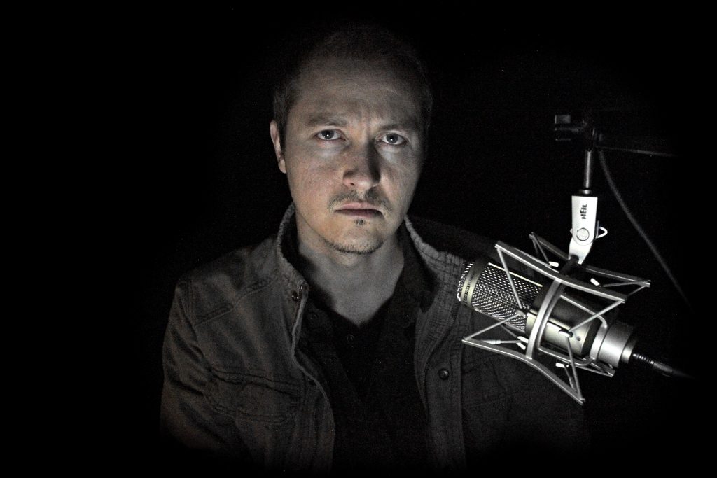  Micah in one of his many roles, as podcaster for his show,  https://www.gralienreport.com/  