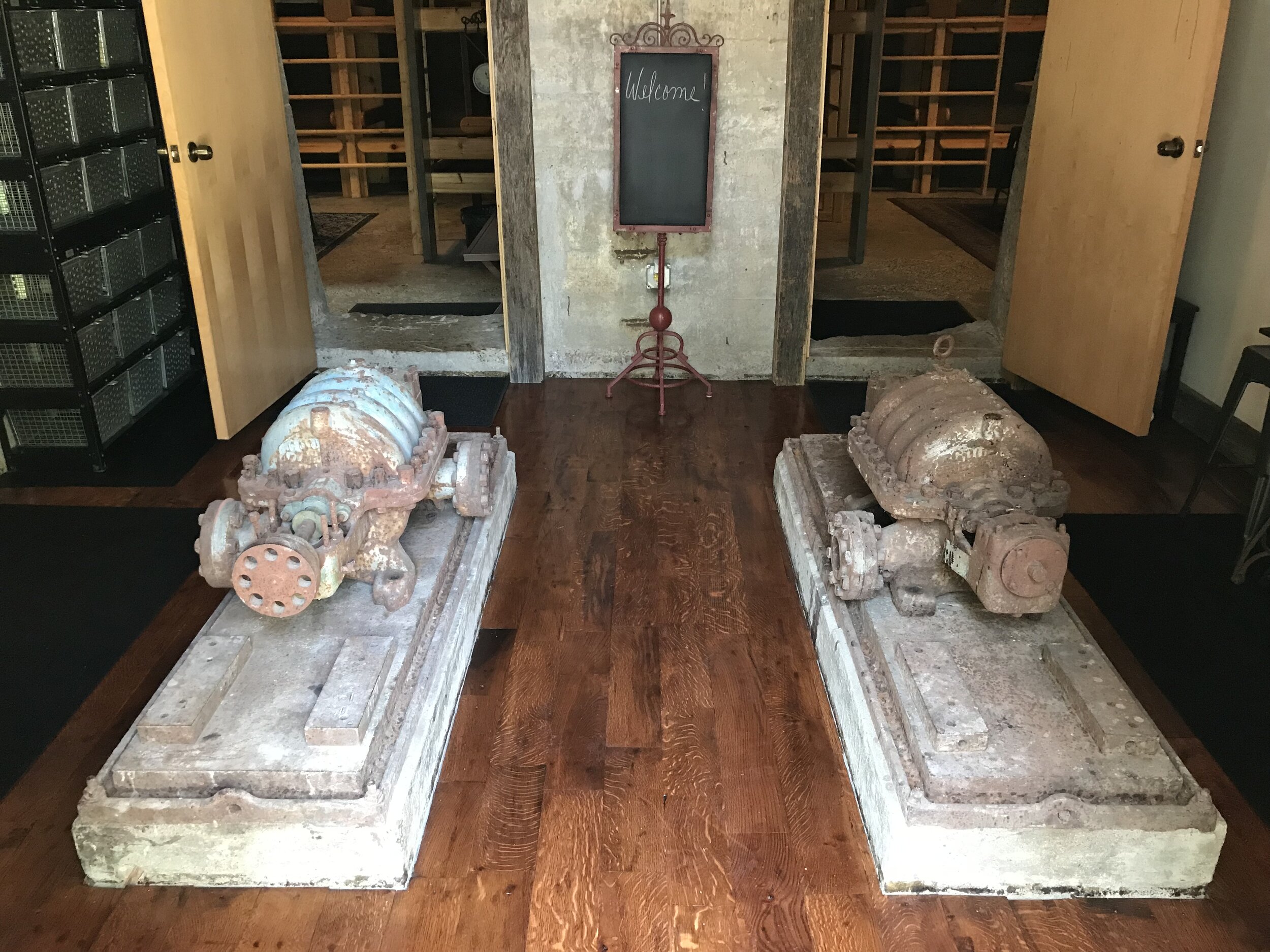 The original water pumps for the facility’s large cisterns left in place in the entrance to the bunkhouse.