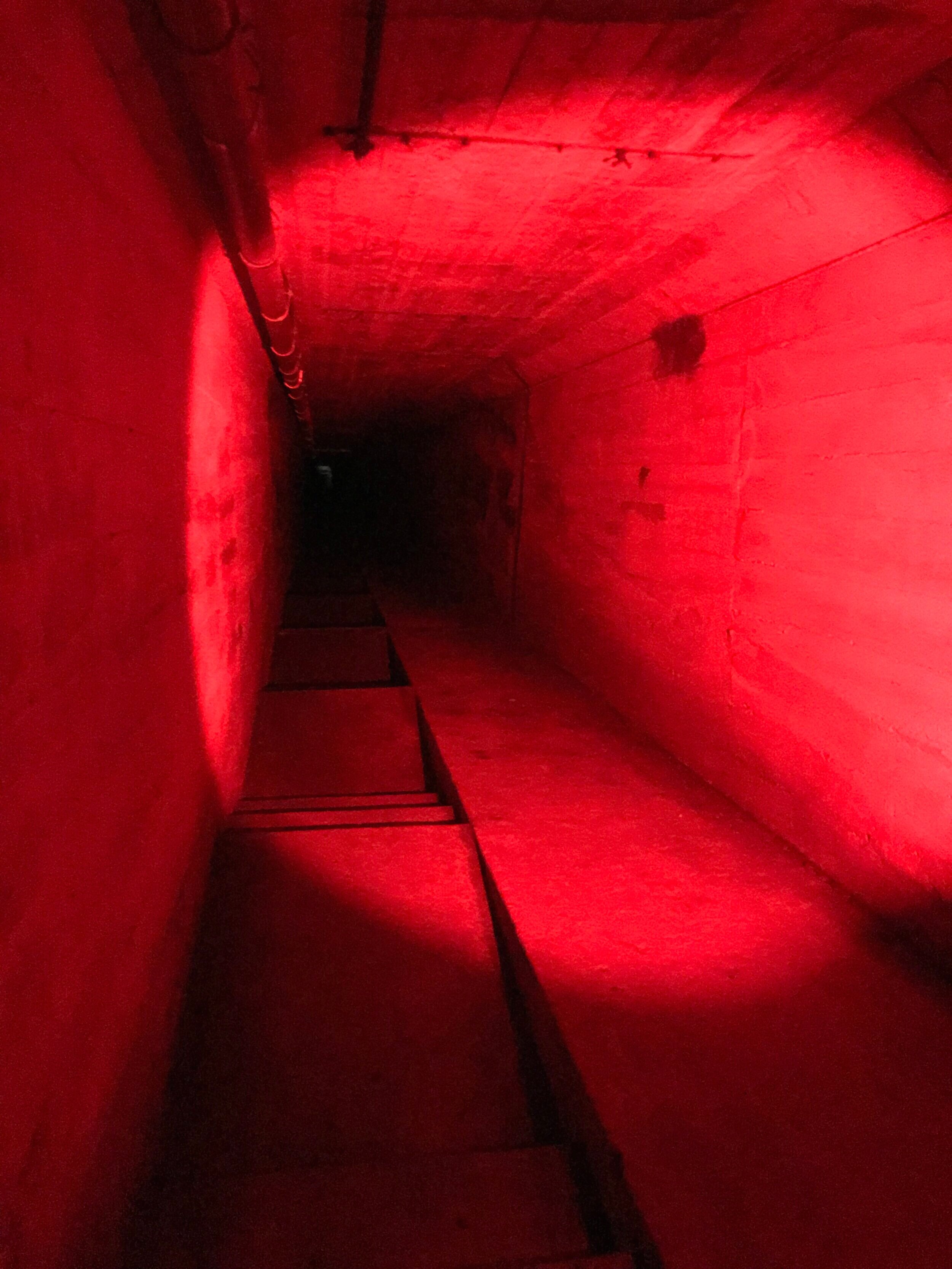  Halfway down the “Death Tunnel” where something is strangely illuminated where no light should be.  