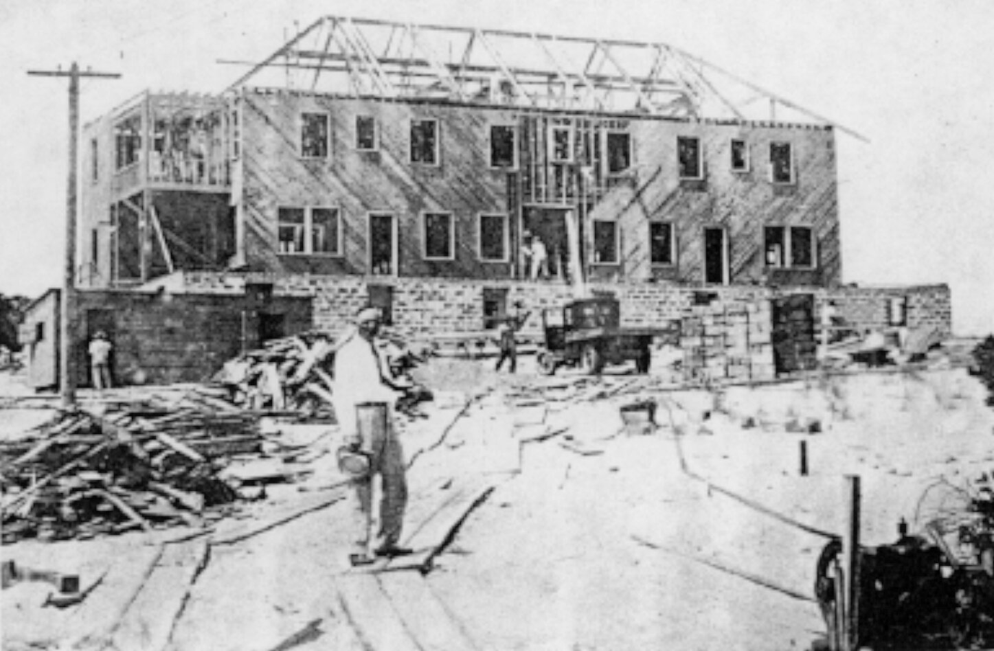  Construction of the original hospital, Edgar in the foreground.  Used by permission–Edgar Cayce Foundation–Virginia Beach, VA; EdgarCayce.org 