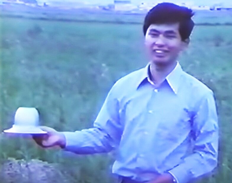  This photo is a still-frame grab from a  Japanese TV documentary  on the incident, probably showing Michio Seo holding a replica of the object at the site of the first contact 