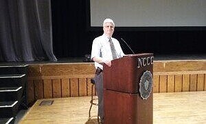  Stan at one of his many speaking engagements.  Photo ©Stan Gordon 