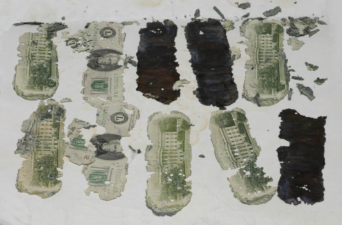  Some of the ransom $20 bills found by 8-year-old Brian Ingram on February 10, 1980, while vacationing with his family at Tina Bar on the Columbia River, downstream from Vancouver, WA 