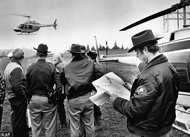  A search of the area in 1976 where Cooper may have landed in. ©AP 